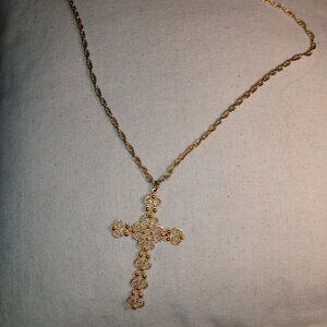 Large gold tone filigree cross with chain necklace.